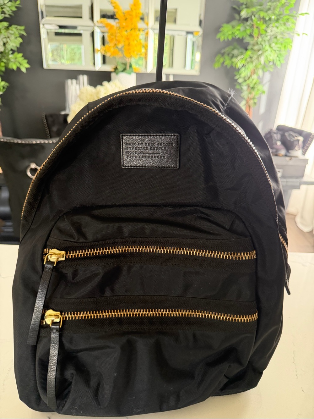 Marc Jacobs Black Backpack with Gold Zippers